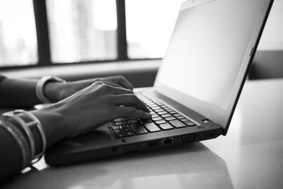 Working through clinic numbers at a desk