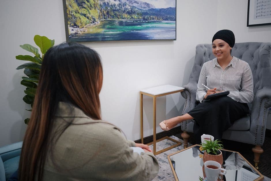 Two people in a clinic planning meeting